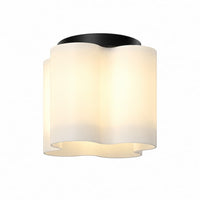 Kuzco Clover FM54809 9-inch LED flush mount with sculptural clover-shaped matte opal glass shade and modern contemporary design
