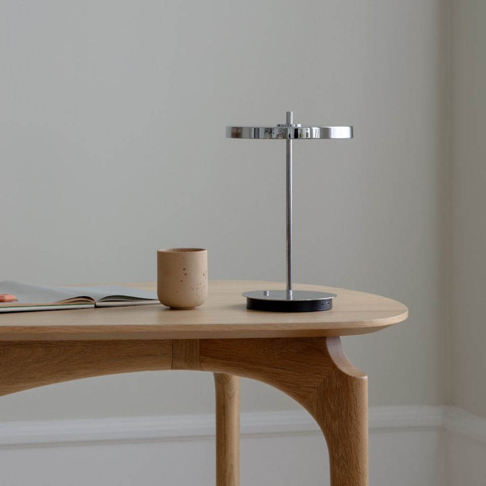 UMAGE Asteria Move Portable Table Lamp - Polished Steel / Polished Steel — styled interior view 5
