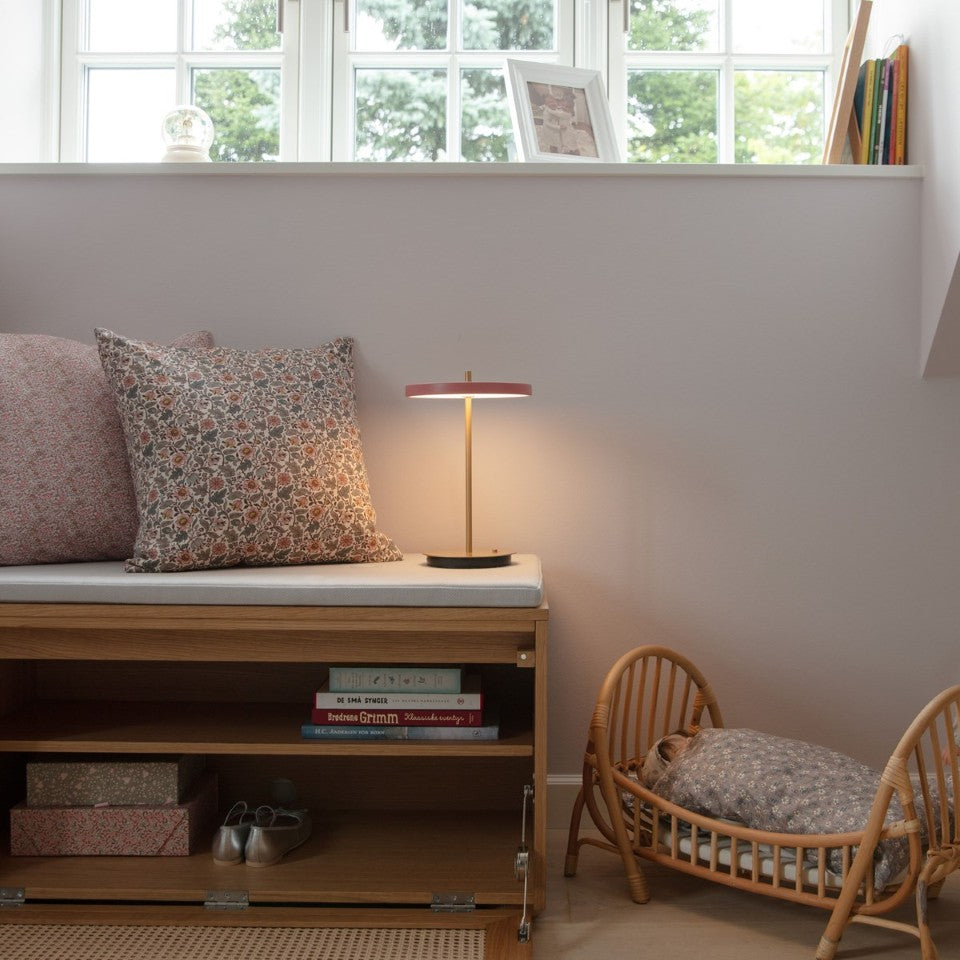 UMAGE Asteria Move LED Portable Table Lamp in Nuance Rose — styled interior view 6