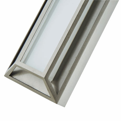 Minimalist low profile LED outdoor light with mitered glass for patio walls
