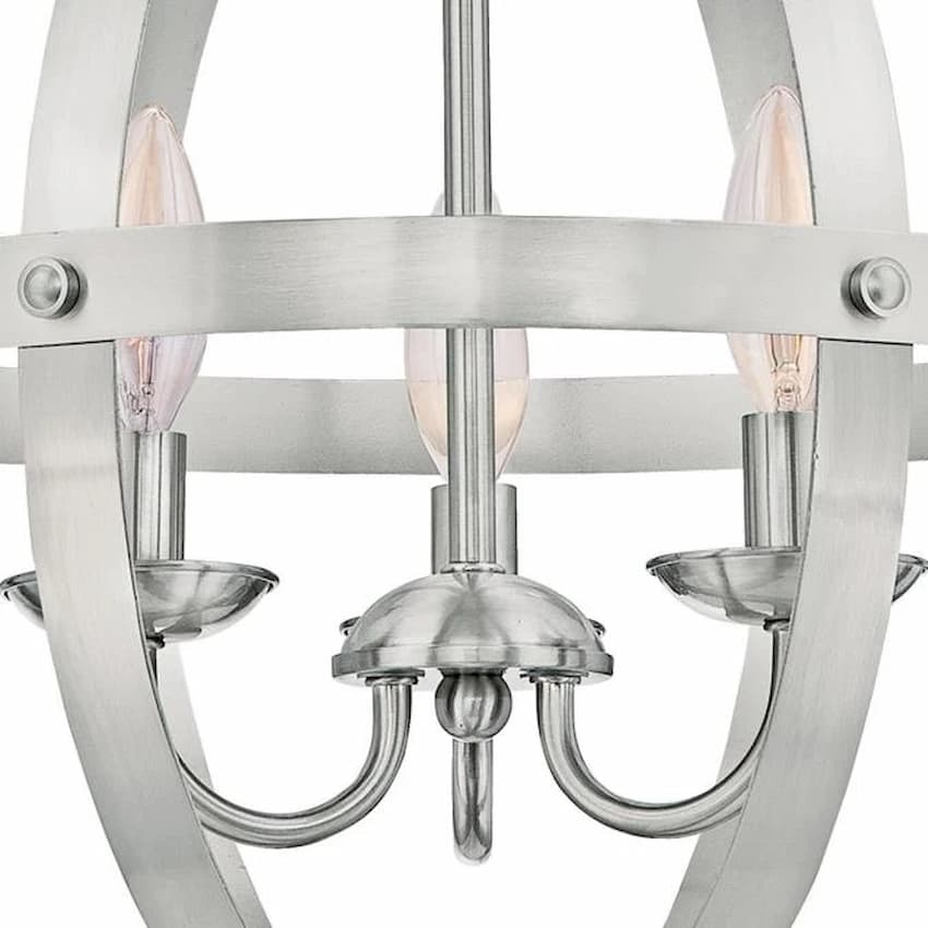 Westinghouse 6341900 Stella Mira chandelier featuring wide metal bands surrounding three exposed candelabra-style lights