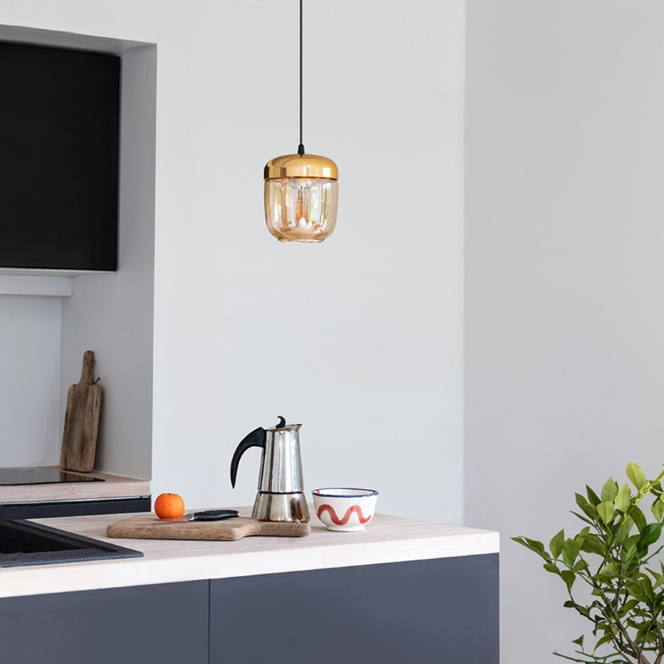 UMAGE Acorn Brass and Amber Glass Replacement Shade — styled interior view