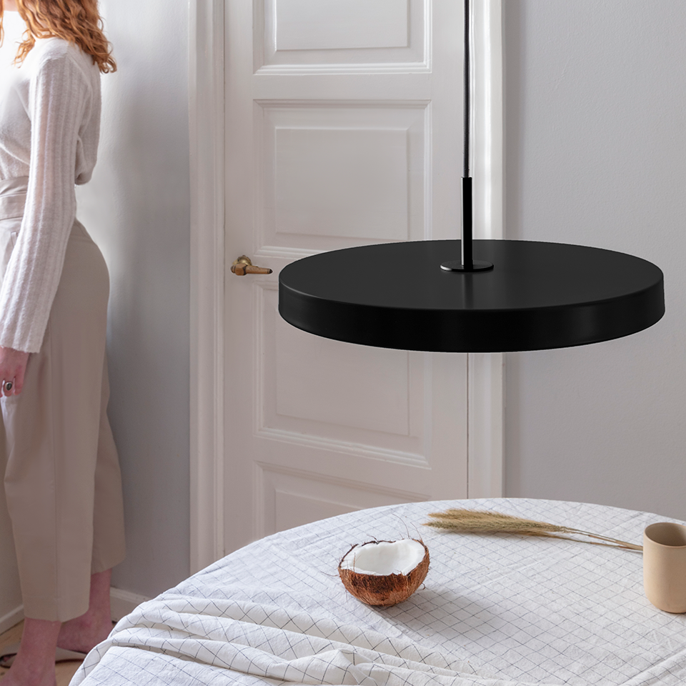 UMAGE Asteria LED Pendant in Black with Black Connector — styled interior view