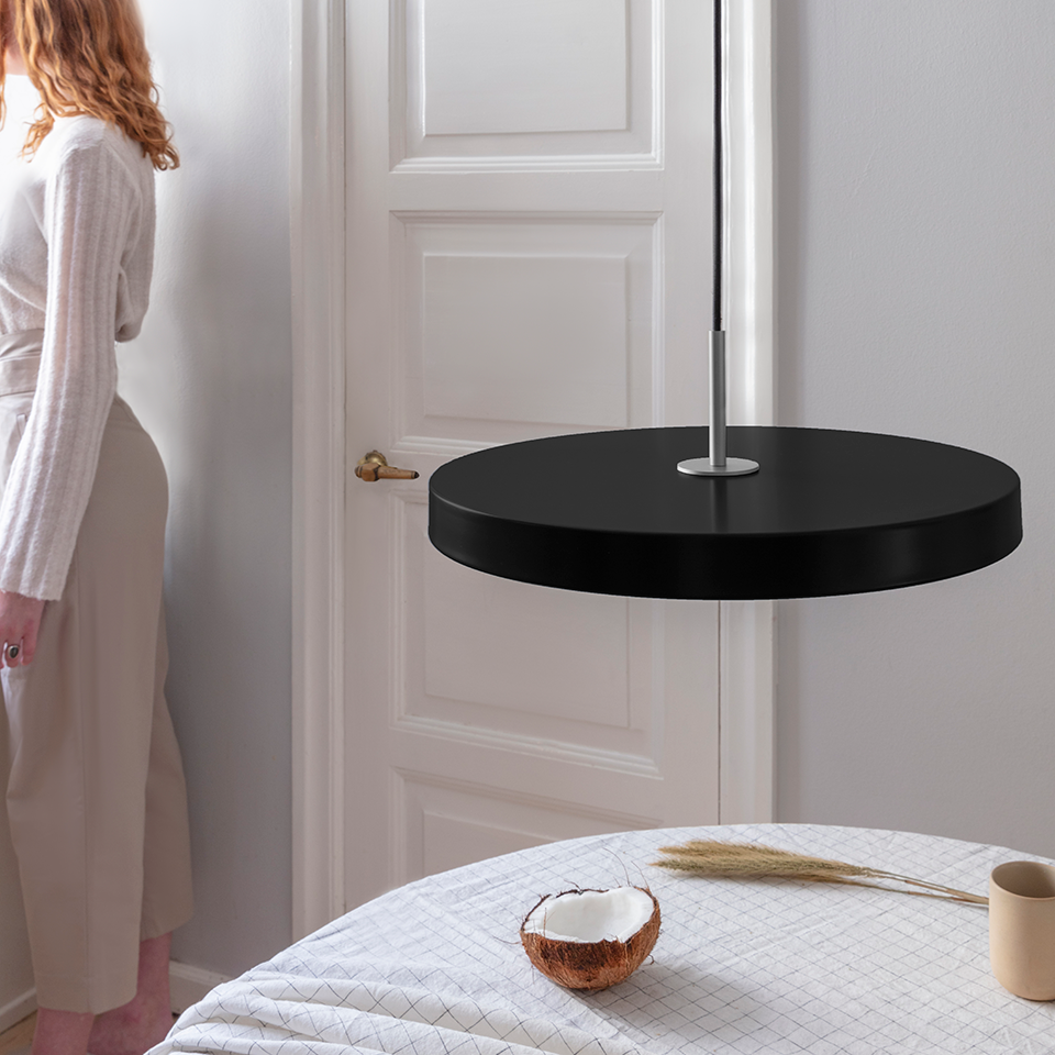 UMAGE Asteria LED Pendant in Black with Steel Connector — styled interior view