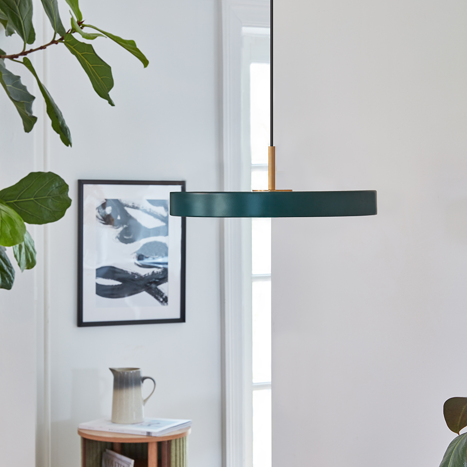 UMAGE Asteria Mini LED Pendant in Forest Green with Brass Connector — styled interior view 2