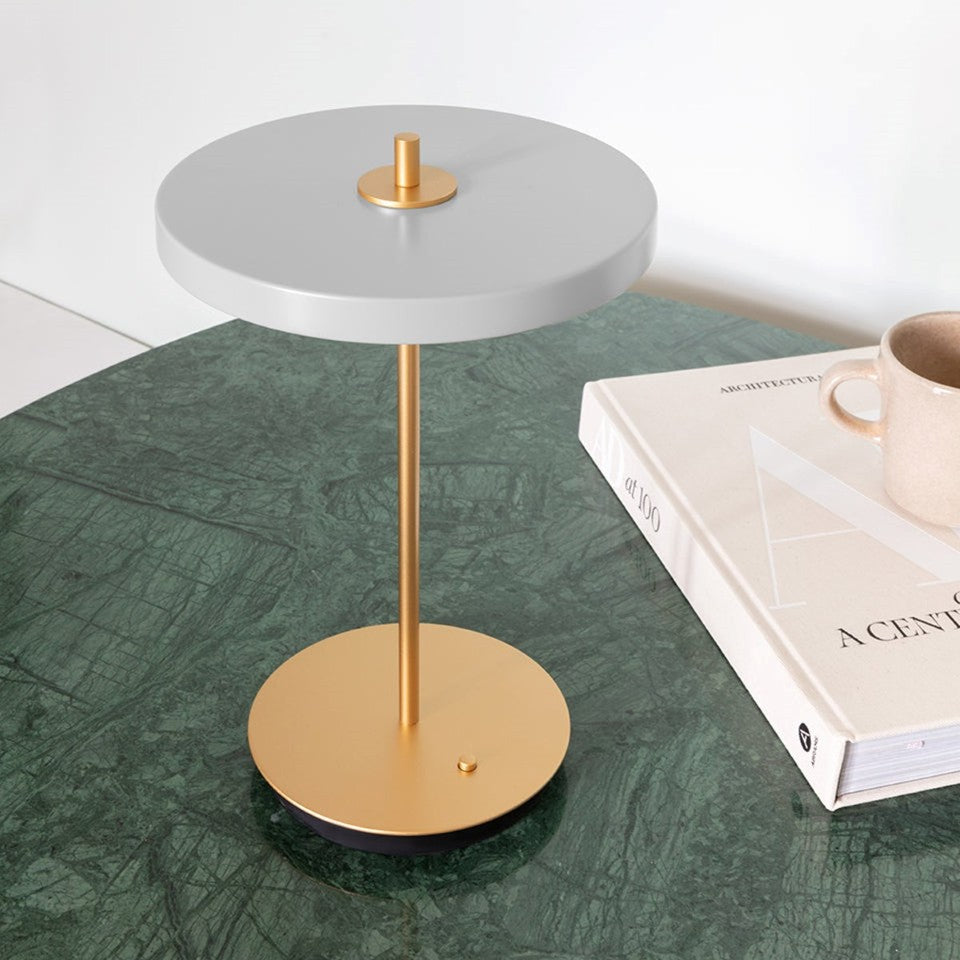 UMAGE Asteria Move LED Portable Table Lamp in Nuance Mist — styled interior view