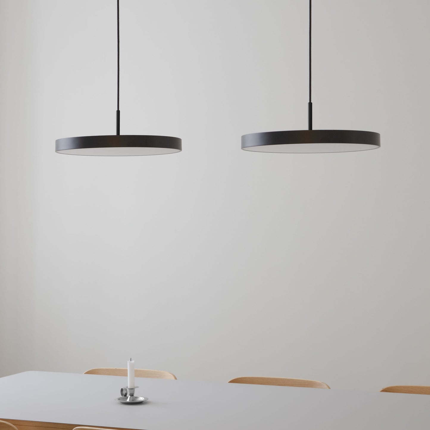 UMAGE Asteria LED Pendant in Black with Black Connector — styled interior view 2