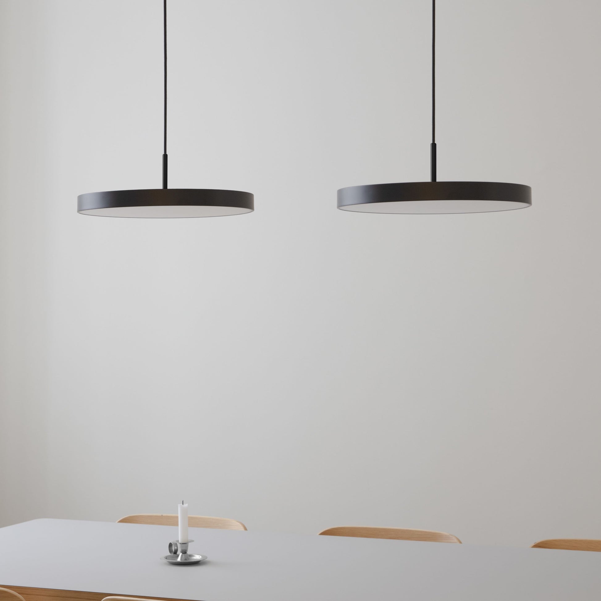UMAGE Asteria LED Pendant in Black with Black Connector — styled interior view 2