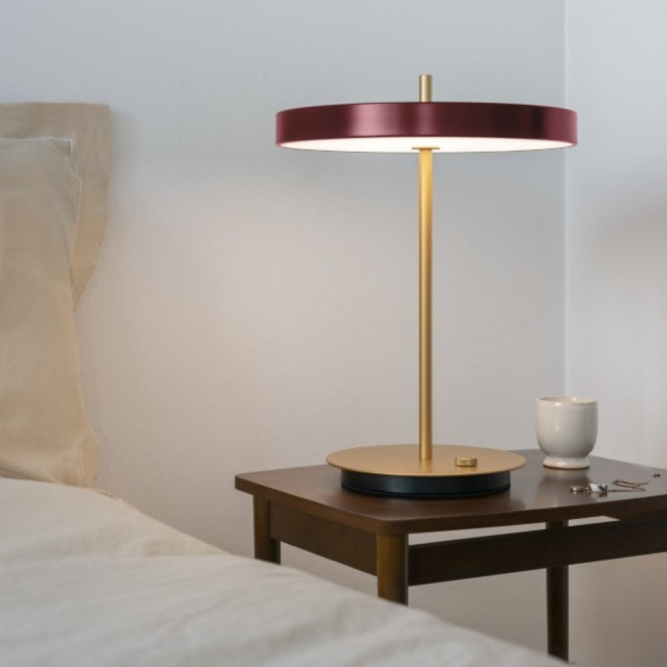 UMAGE Asteria LED Table Lamp in Ruby Red — styled interior view