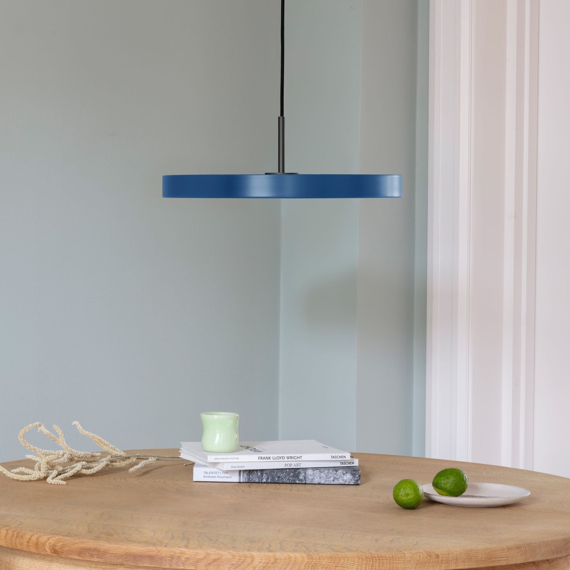 UMAGE Asteria LED Pendant in Petrol Blue with Black Connector — styled interior view