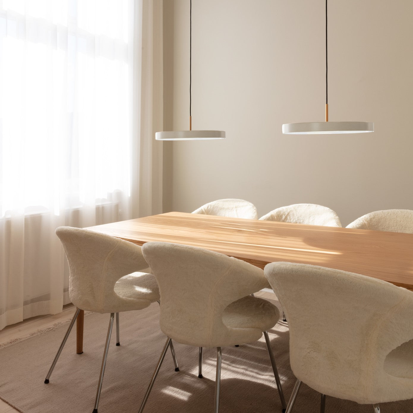 UMAGE Asteria LED Pendant in Pearl White with Brass Connector — styled interior view 7