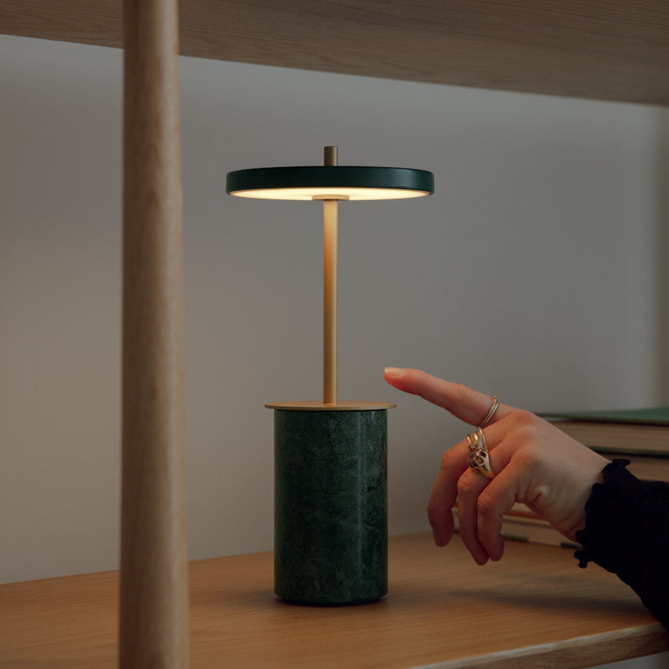 UMAGE Asteria Move Mini Portable Table Lamp - Green — styled interior view