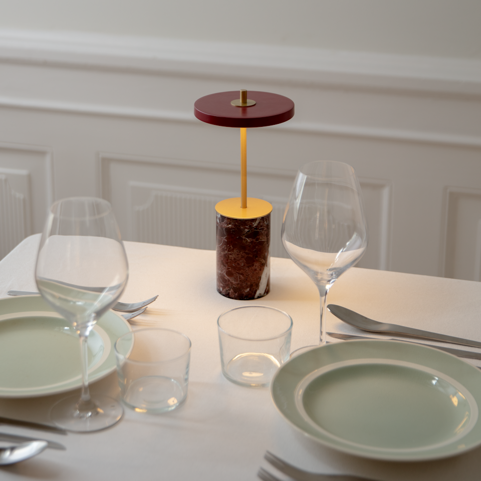 UMAGE Asteria Move Mini Portable Table Lamp - Red — styled interior view 3