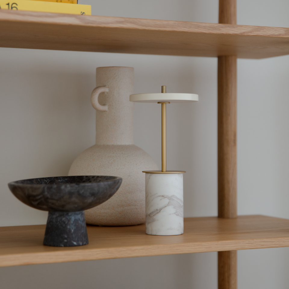 UMAGE Asteria Move Mini Portable Table Lamp - White — styled interior view