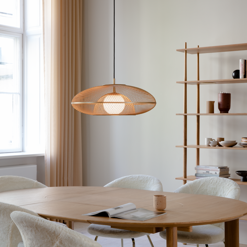 UMAGE Faraday Large Brushed Brass Replacement Shade — styled interior view