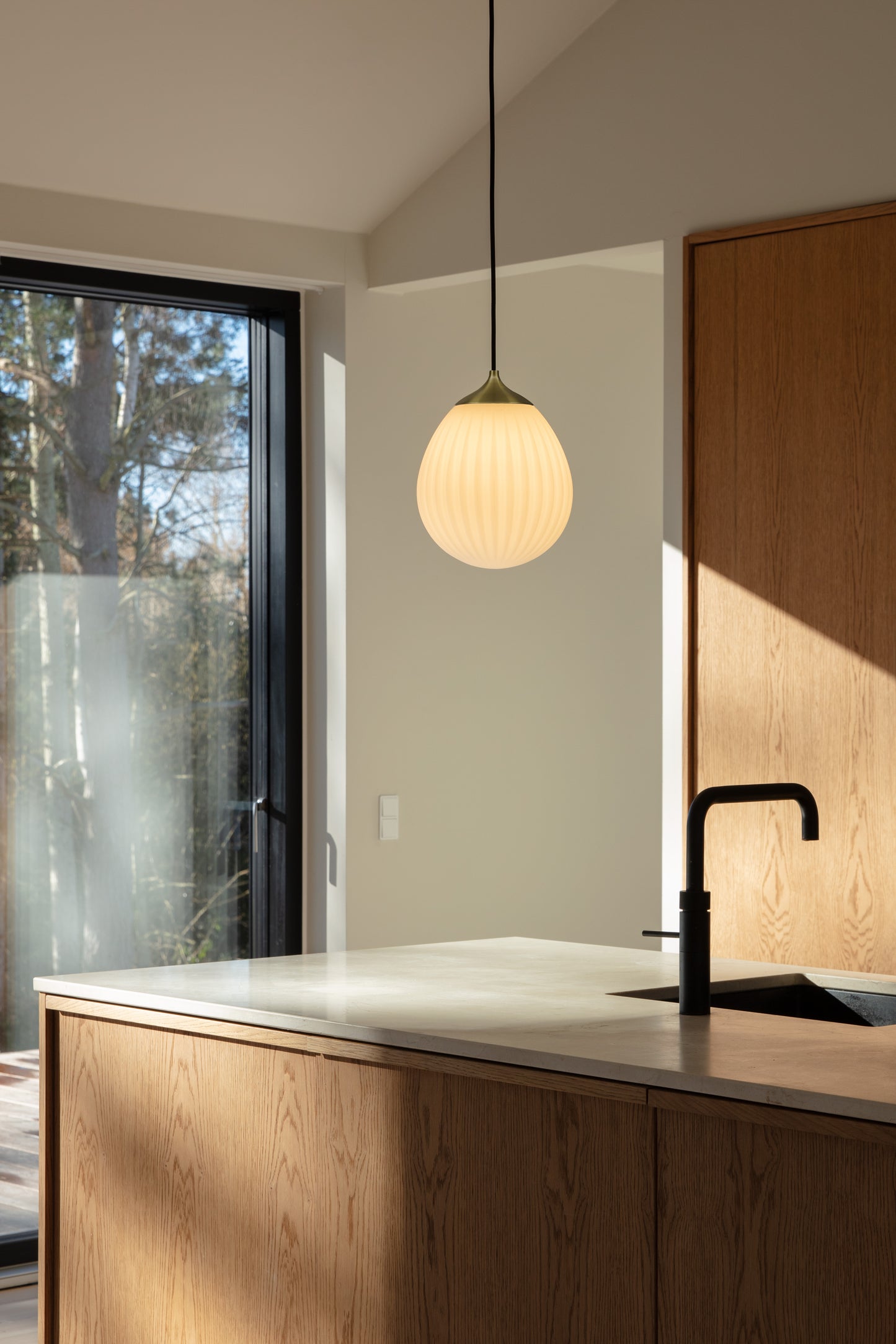 UMAGE Around The World Mini with Pendant Top Cover - Brushed Brass — styled interior view 2