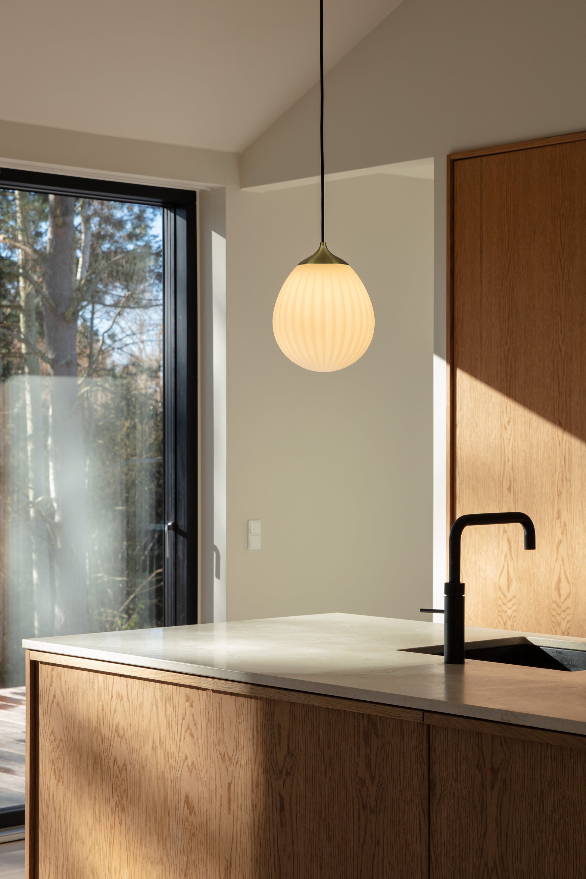 UMAGE Around The World Mini with Pendant Top Cover - Brushed Brass — styled interior view 2