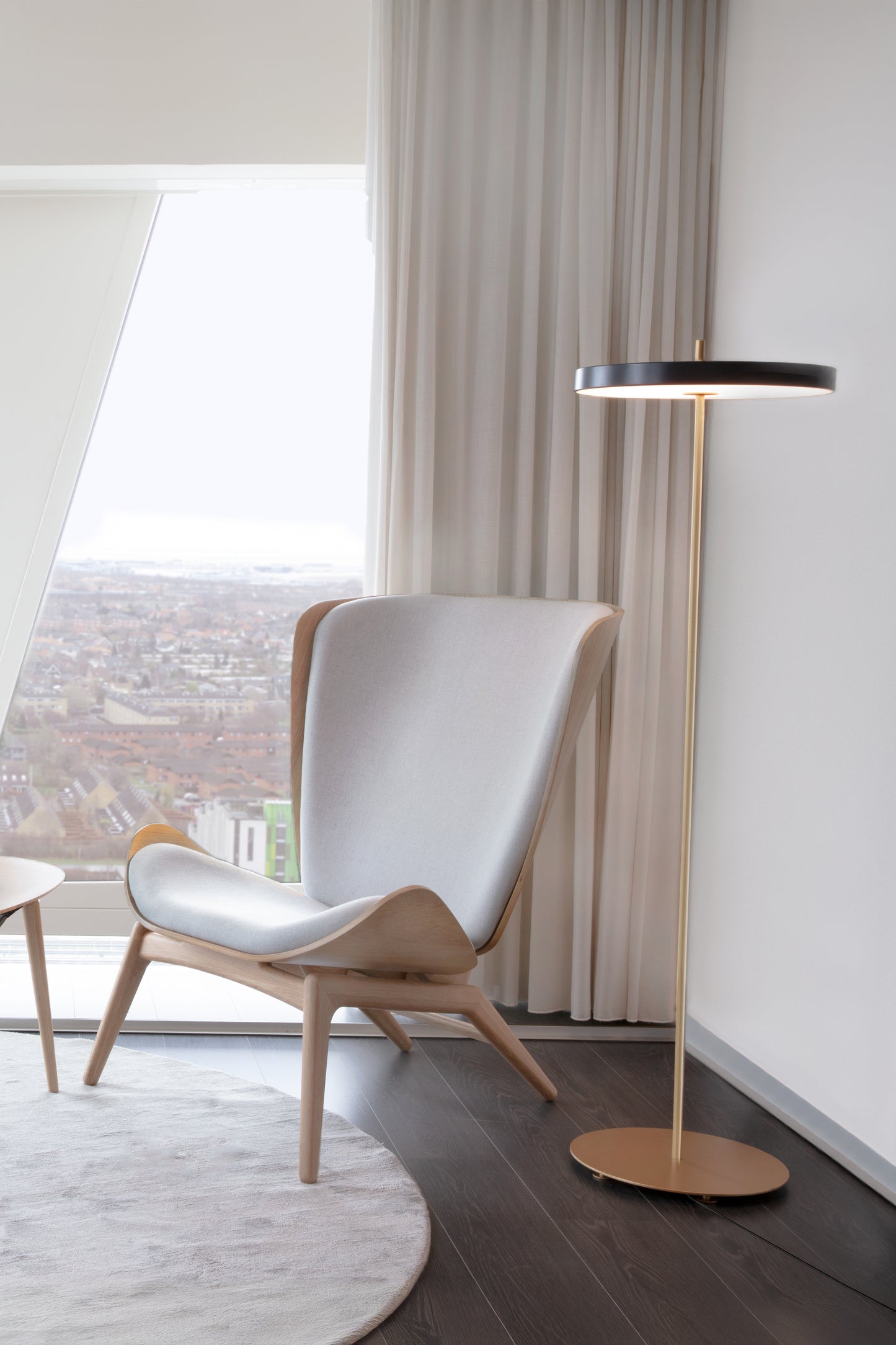 UMAGE Asteria LED Floor Lamp in Anthracite Grey — styled interior view