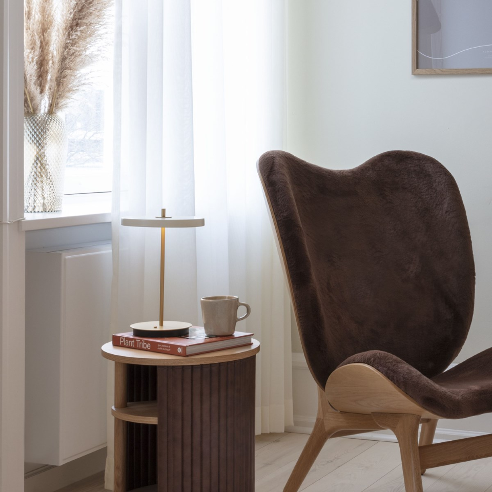 UMAGE Asteria Move LED Portable Table Lamp in Pearl White — styled interior view 8