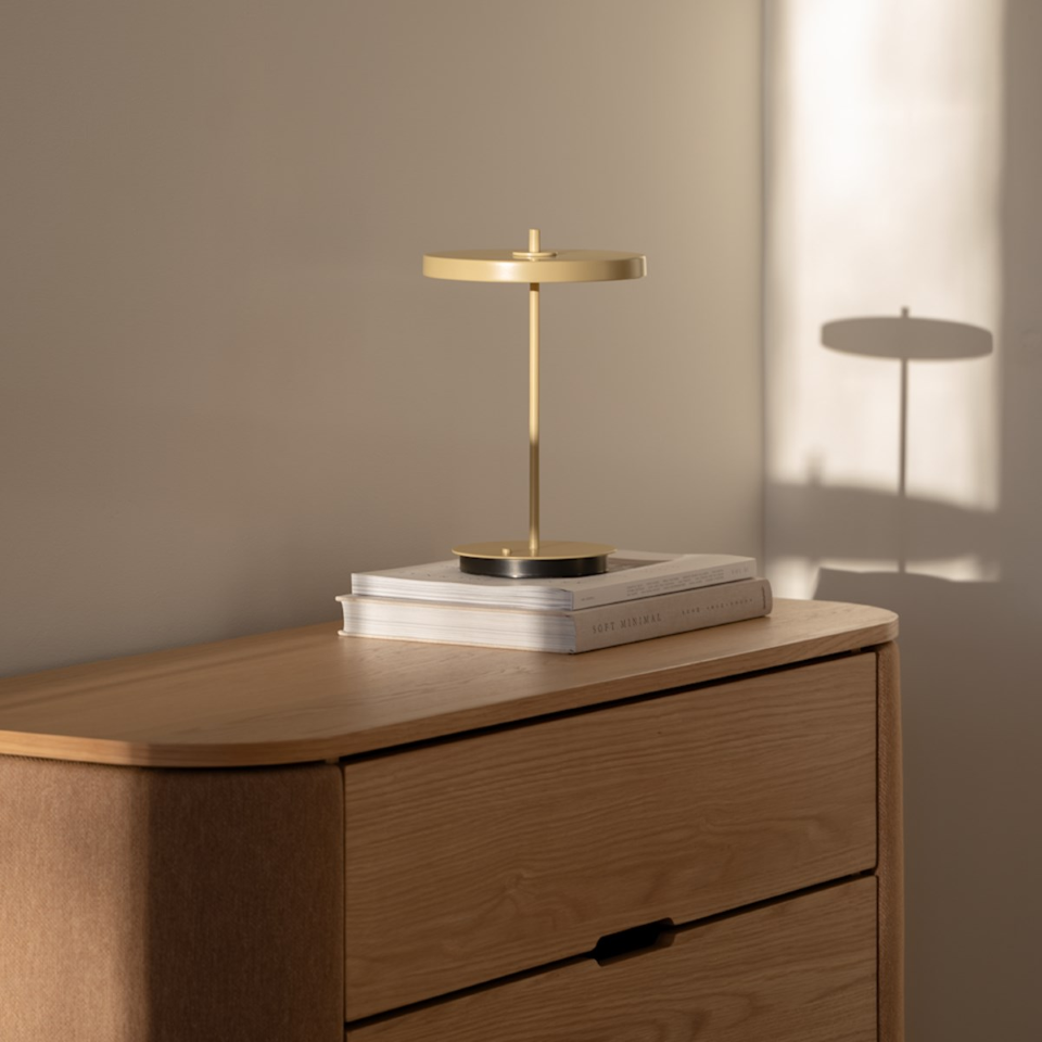 UMAGE Asteria Move Monochrome Portable Table Lamp - Clay — styled interior view 2