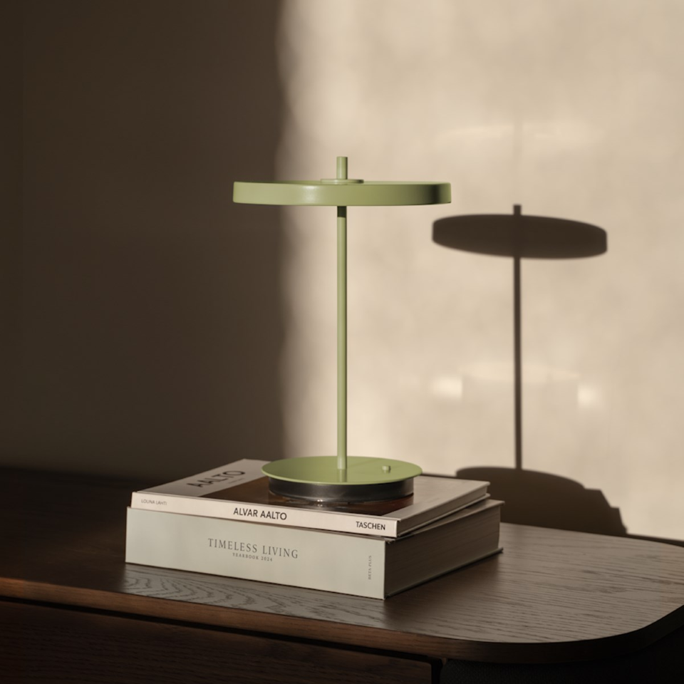 UMAGE Asteria Move Monochrome Portable Table Lamp - Nuance Olive — styled interior view 4