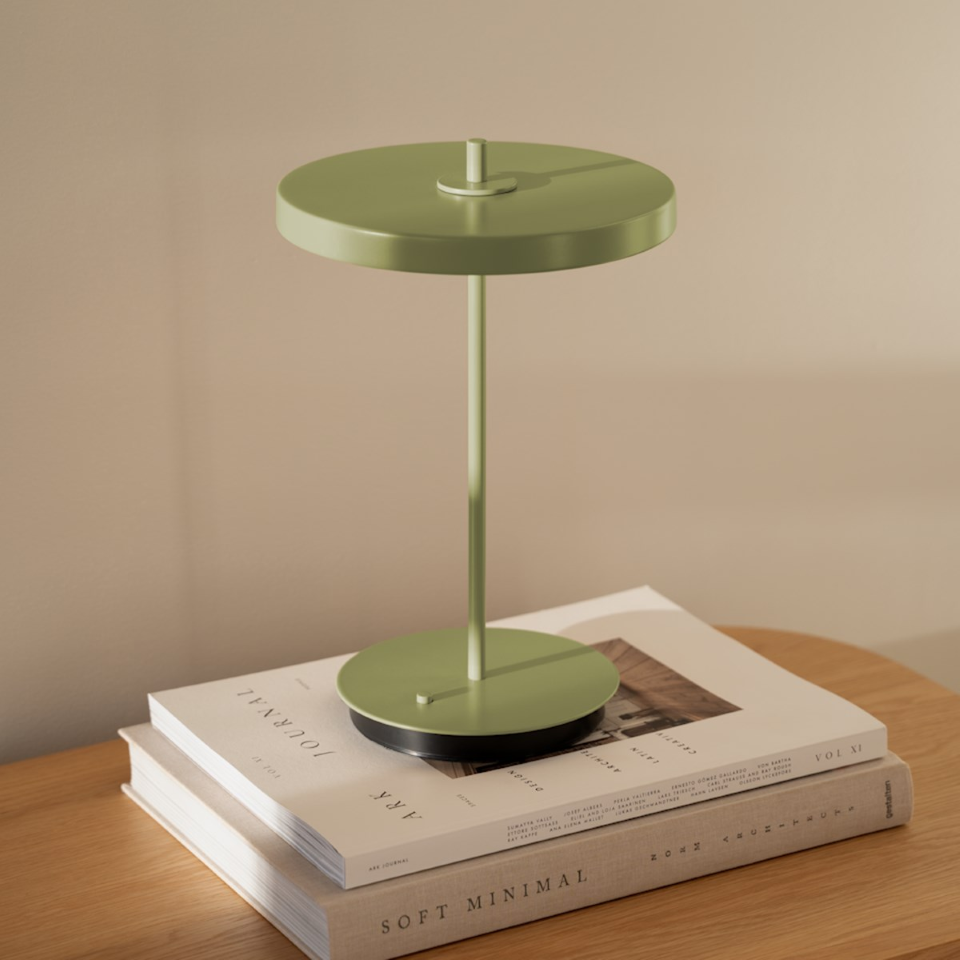 UMAGE Asteria Move Monochrome Portable Table Lamp - Nuance Olive — styled interior view