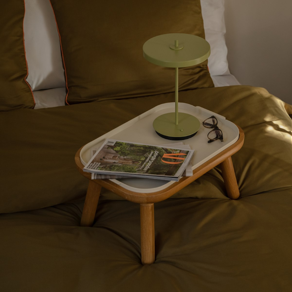 UMAGE Asteria Move Monochrome Portable Table Lamp - Nuance Olive — styled interior view 2