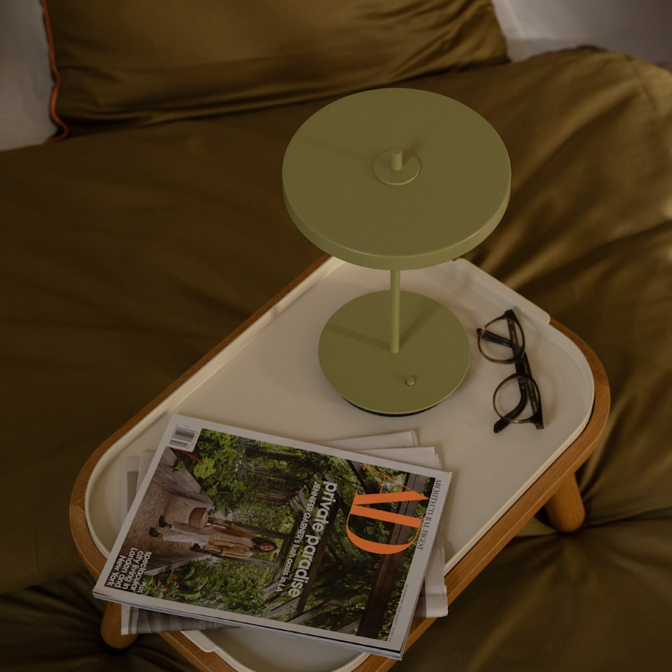UMAGE Asteria Move Monochrome Portable Table Lamp - Nuance Olive — styled interior view 3