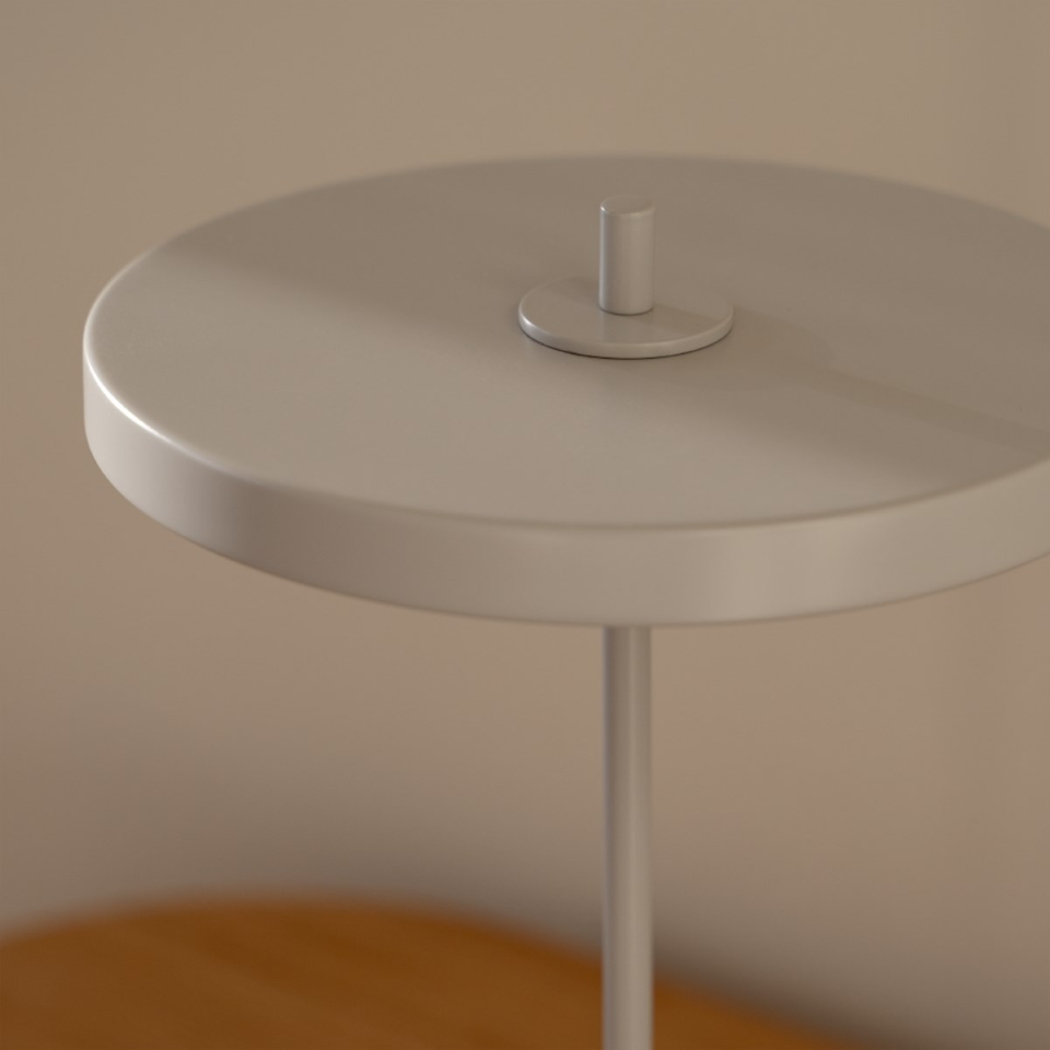 UMAGE Asteria Move Monochrome Portable Table Lamp - Nuance Mist — styled interior view 2