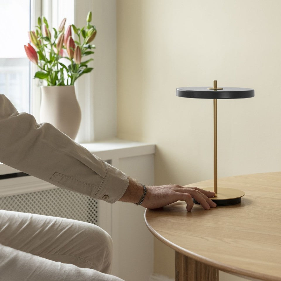 UMAGE Asteria Move LED Portable Table Lamp in Anthracite — styled interior view 6