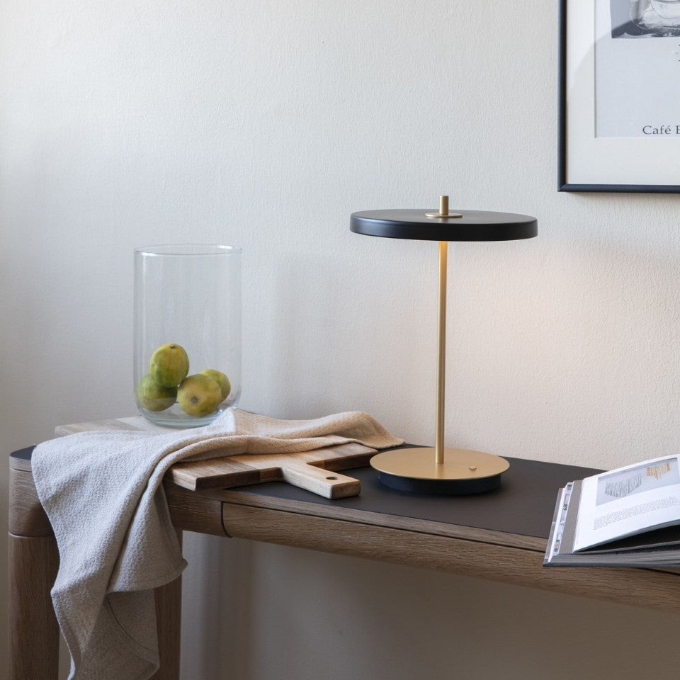 UMAGE Asteria Move LED Portable Table Lamp in Black — styled interior view 16
