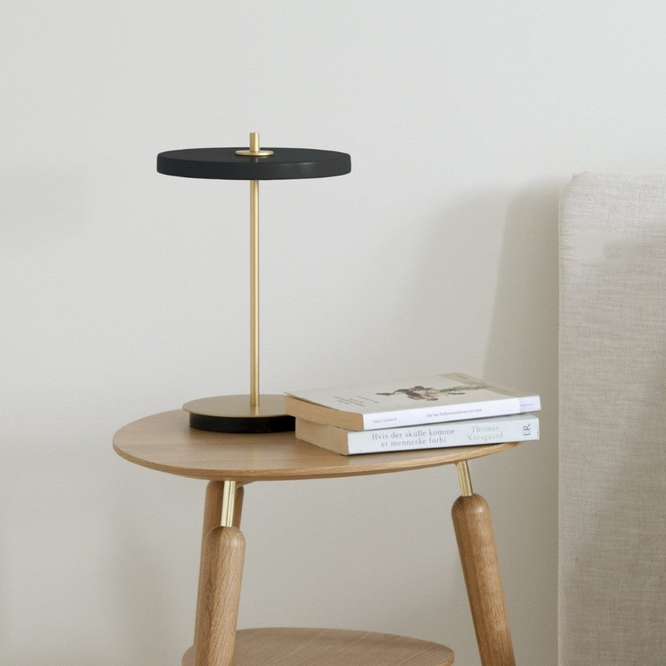 UMAGE Asteria Move LED Portable Table Lamp in Black — styled interior view 14