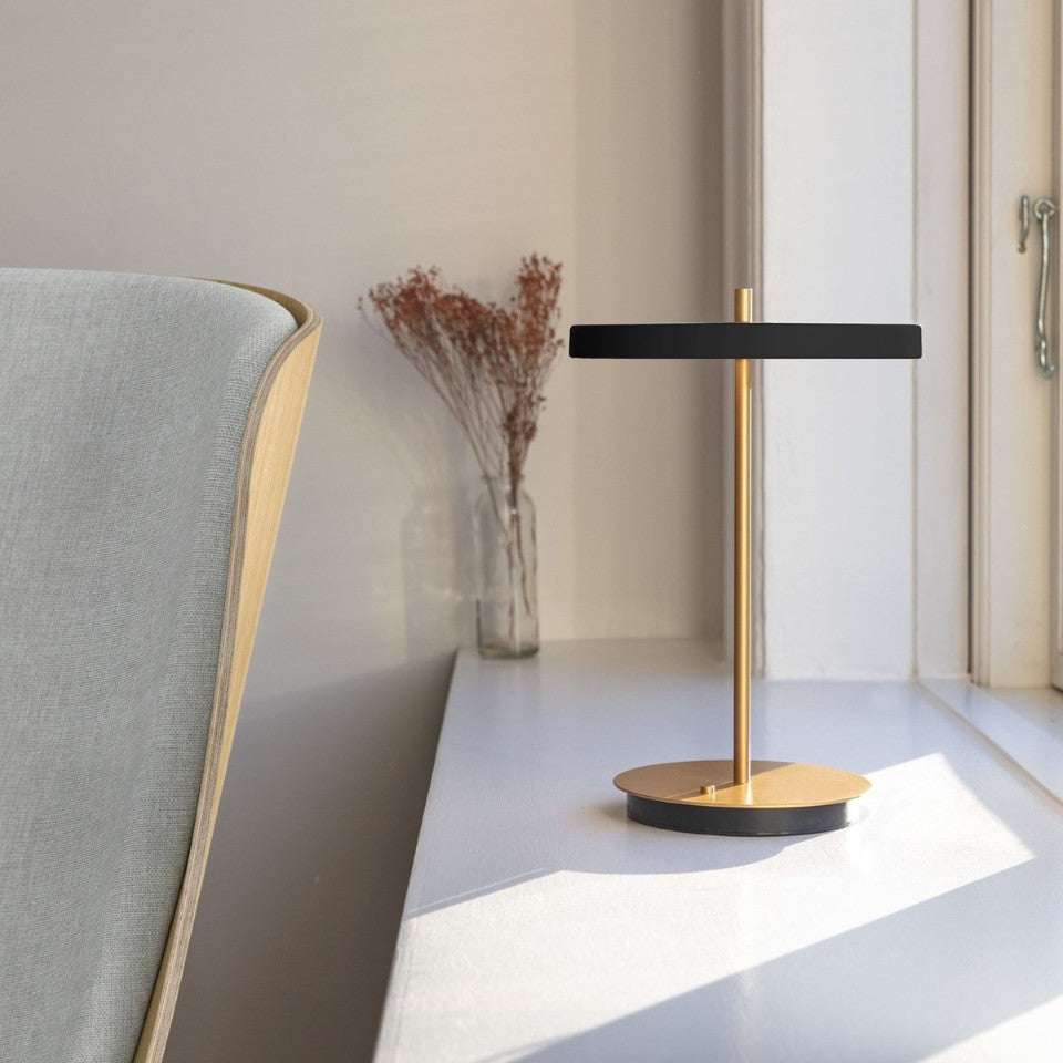 UMAGE Asteria Move LED Portable Table Lamp in Black — styled interior view 2
