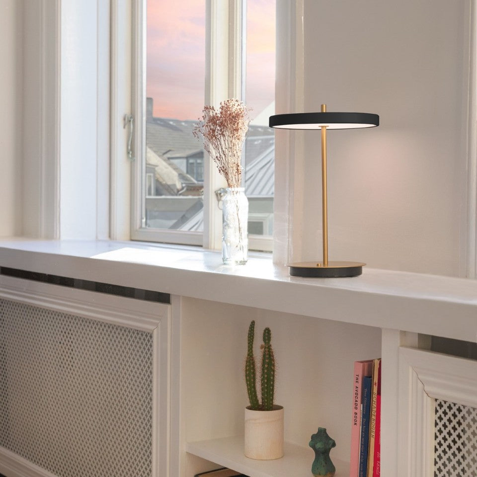 UMAGE Asteria Move LED Portable Table Lamp in Black — styled interior view 12