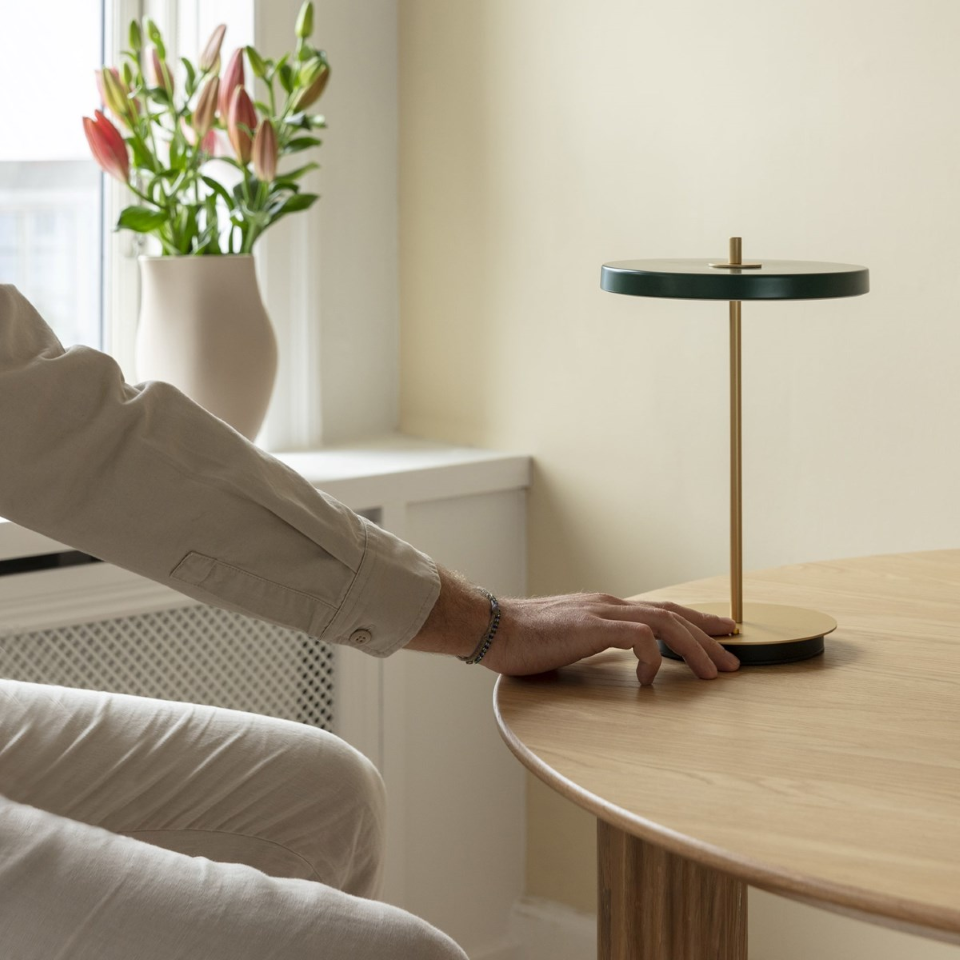 UMAGE Asteria Move LED Portable Table Lamp in Forest Green — styled interior view 2