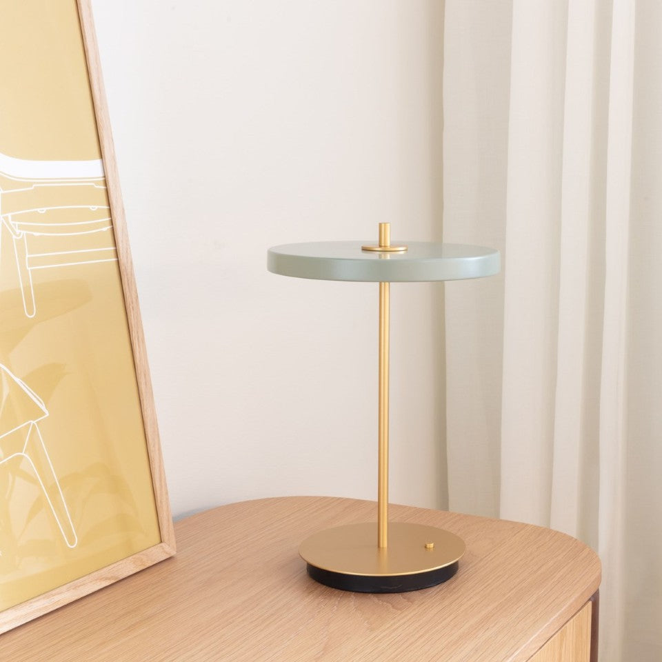 UMAGE Asteria Move LED Portable Table Lamp in Nuance Olive — styled interior view 15