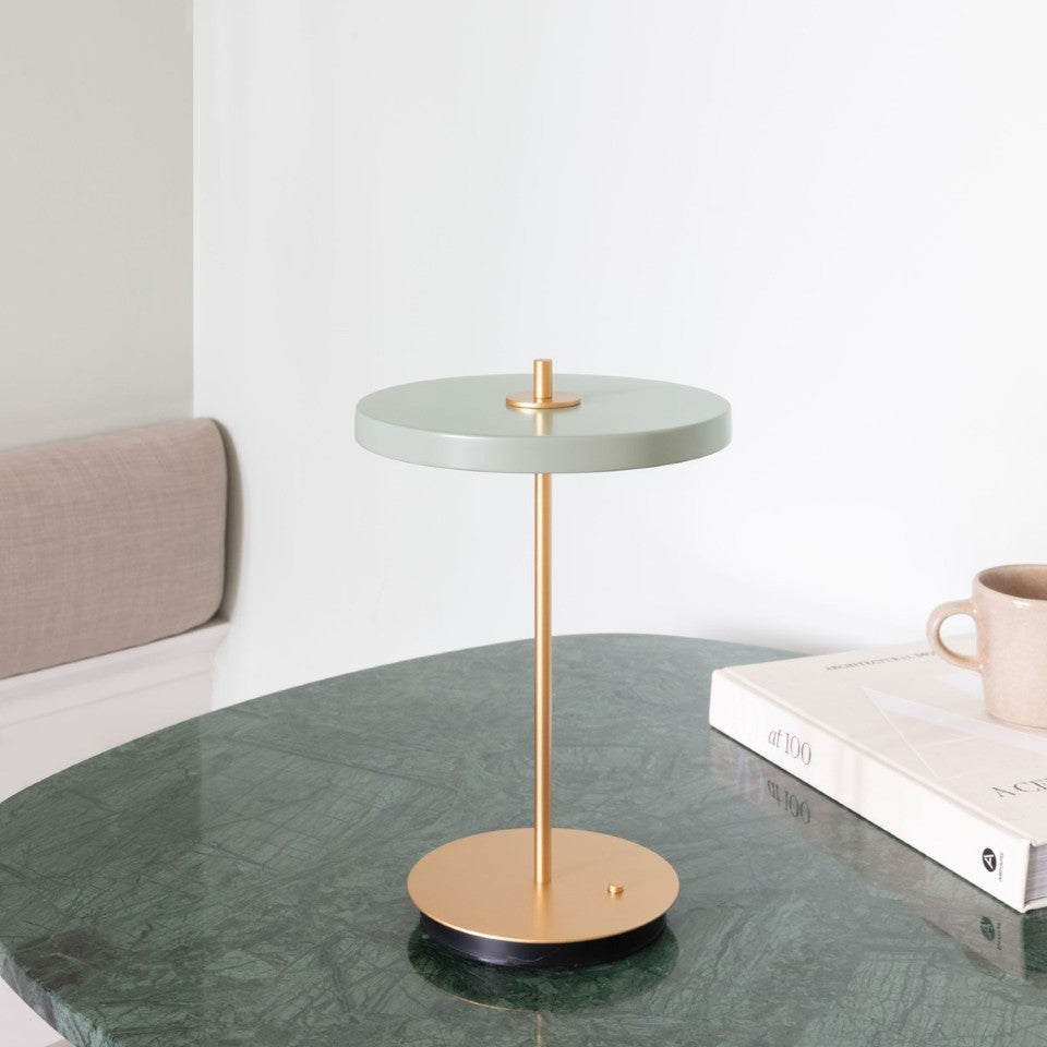 UMAGE Asteria Move LED Portable Table Lamp in Nuance Olive — styled interior view 10