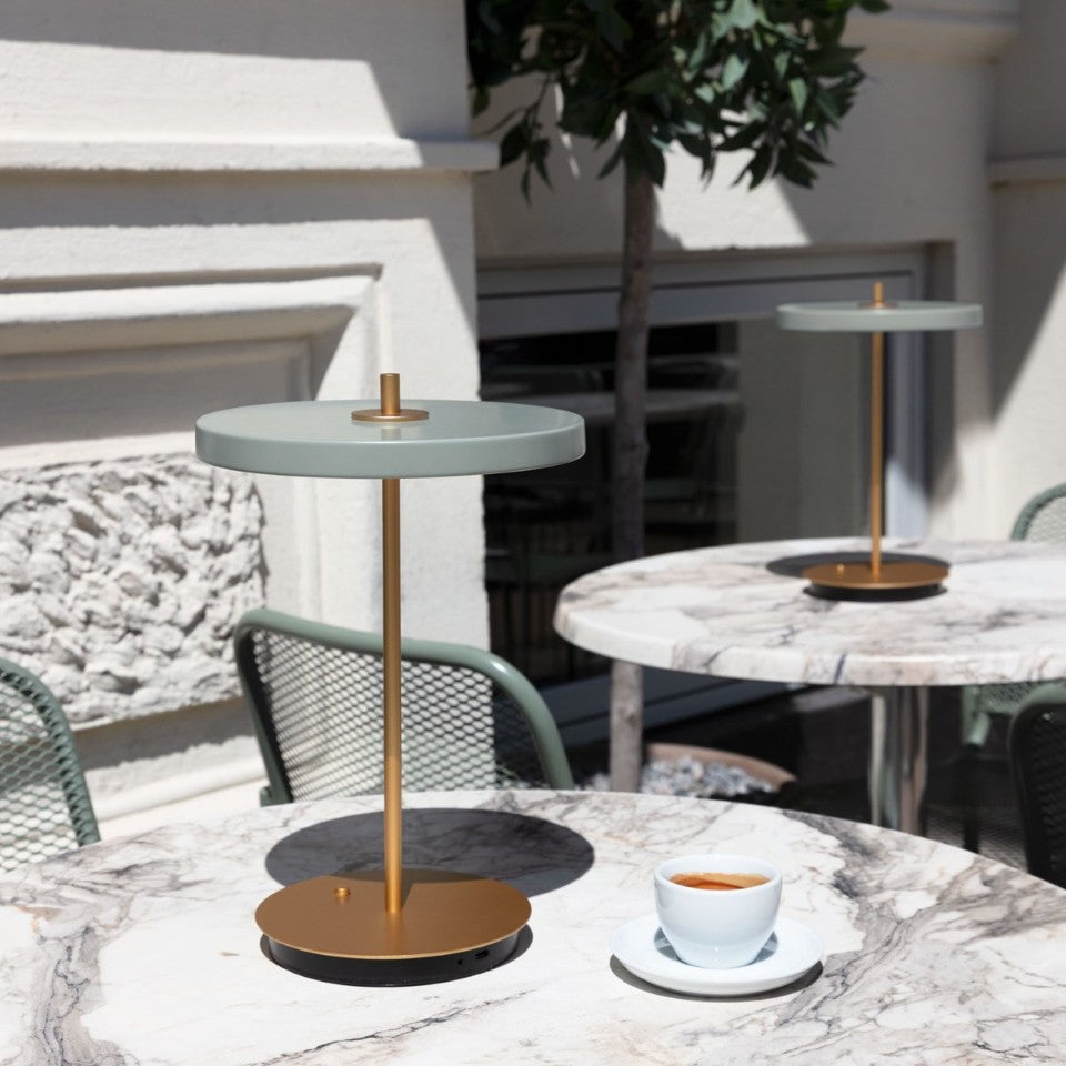 UMAGE Asteria Move LED Portable Table Lamp in Nuance Olive — styled interior view 8