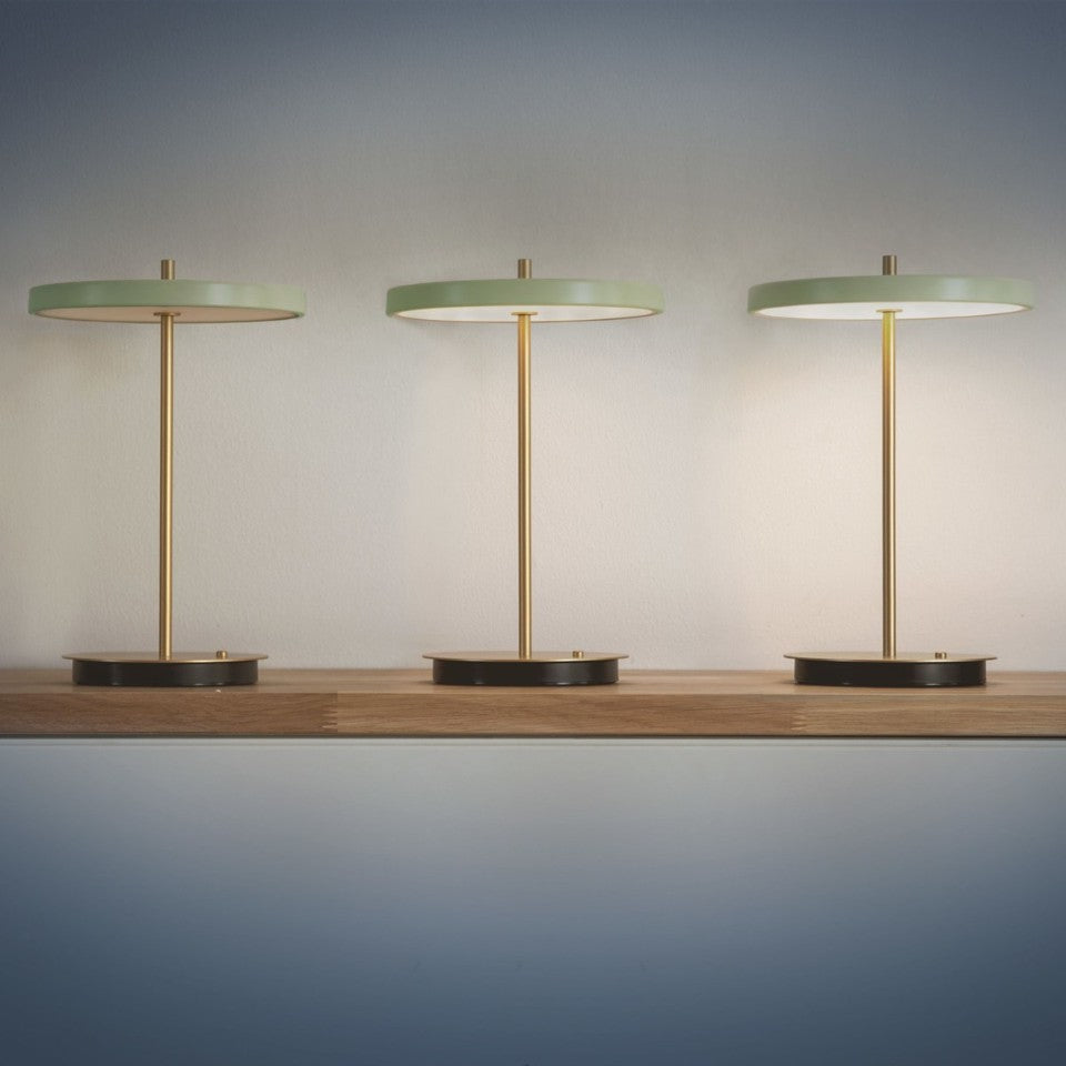 UMAGE Asteria Move LED Portable Table Lamp in Nuance Olive — styled interior view 13