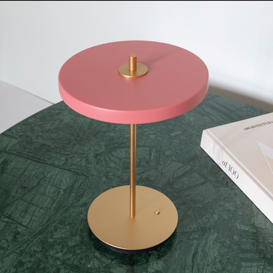 UMAGE Asteria Move LED Portable Table Lamp in Nuance Rose — styled interior view