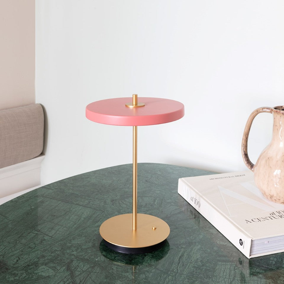 UMAGE Asteria Move LED Portable Table Lamp in Nuance Rose — styled interior view 2