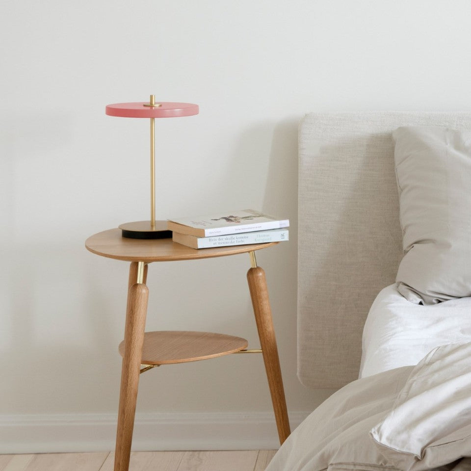 UMAGE Asteria Move LED Portable Table Lamp in Nuance Rose — styled interior view 3