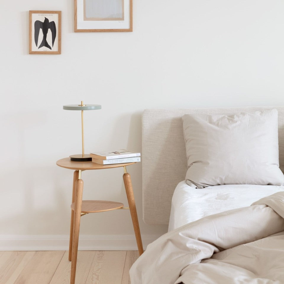 UMAGE Asteria Move LED Portable Table Lamp in Nuance Olive — styled interior view 4