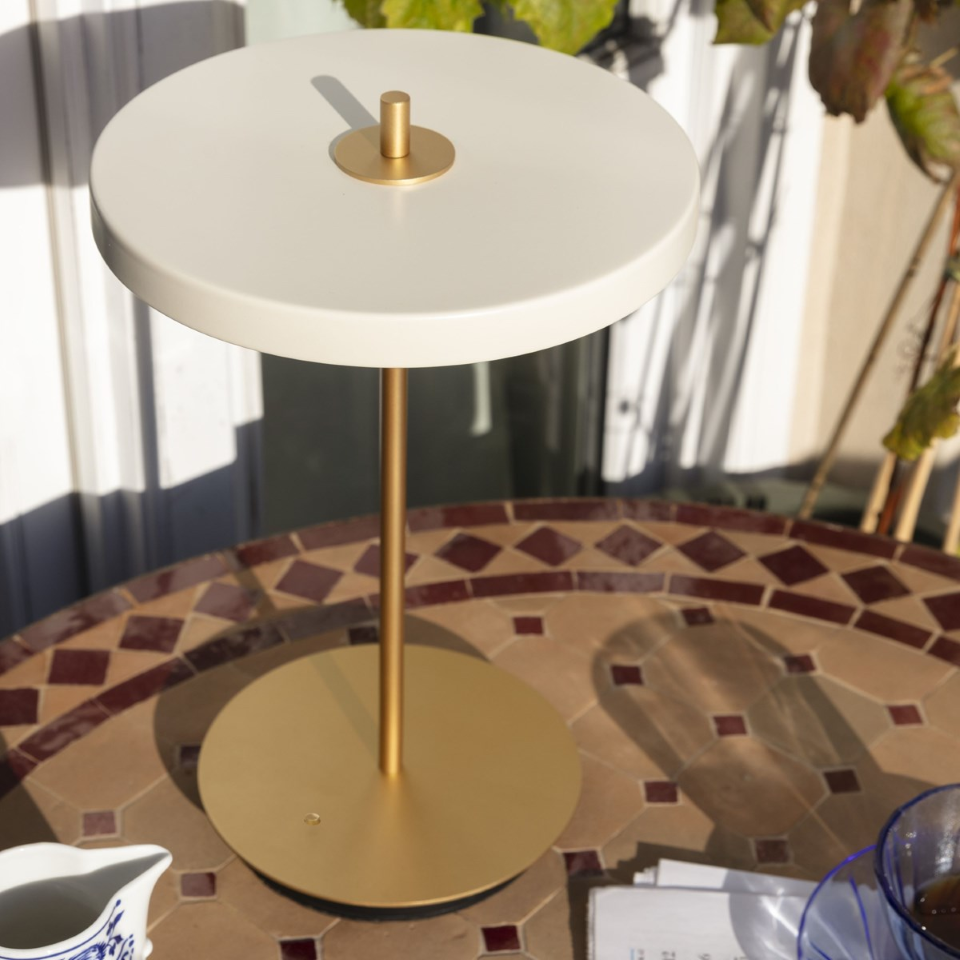 UMAGE Asteria Move LED Portable Table Lamp in Pearl White — styled interior view 9
