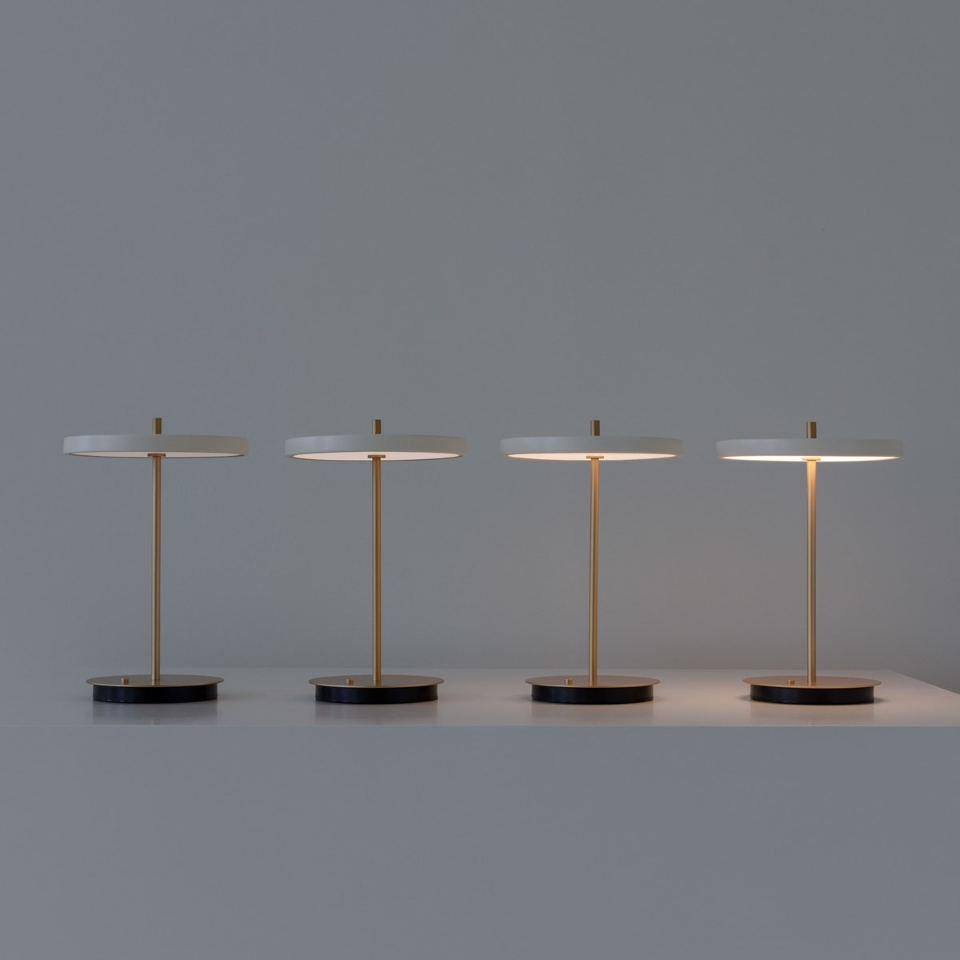 UMAGE Asteria Move LED Portable Table Lamp in Pearl White — styled interior view 5