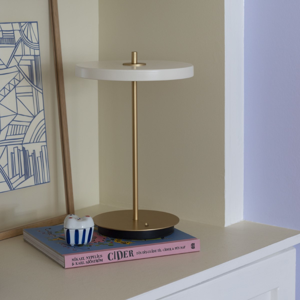 UMAGE Asteria Move LED Portable Table Lamp in Pearl White — styled interior view 13