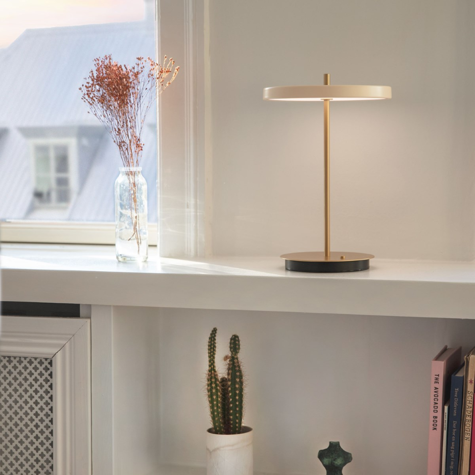 UMAGE Asteria Move LED Portable Table Lamp in Pearl White — styled interior view 12