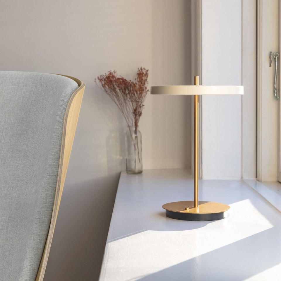 UMAGE Asteria Move LED Portable Table Lamp in Pearl White — styled interior view 10
