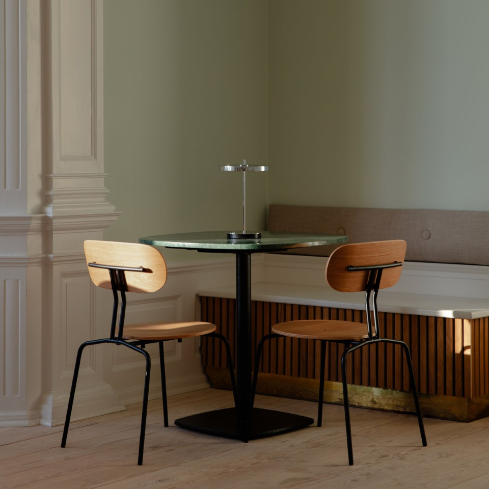 UMAGE Asteria Move Portable Table Lamp - Polished Steel / Polished Steel — styled interior view 2