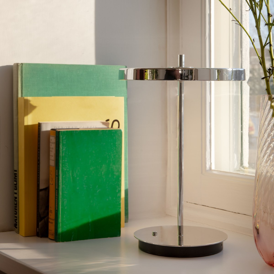 UMAGE Asteria Move Portable Table Lamp - Polished Steel / Polished Steel — styled interior view 3